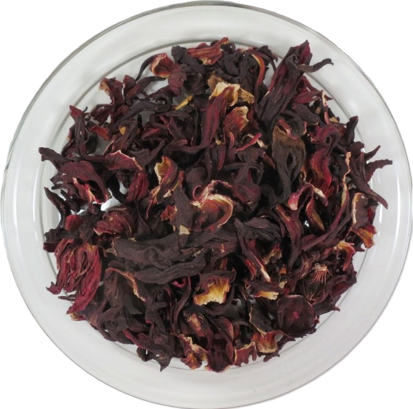 Draufsicht auf ganze, getrocknete Bio-Hibiskusblüten (Karkadeh) in einer runden Glasschale. Die großen, getrockneten Blütenkelche haben eine tief dunkelrote bis violette Färbung.