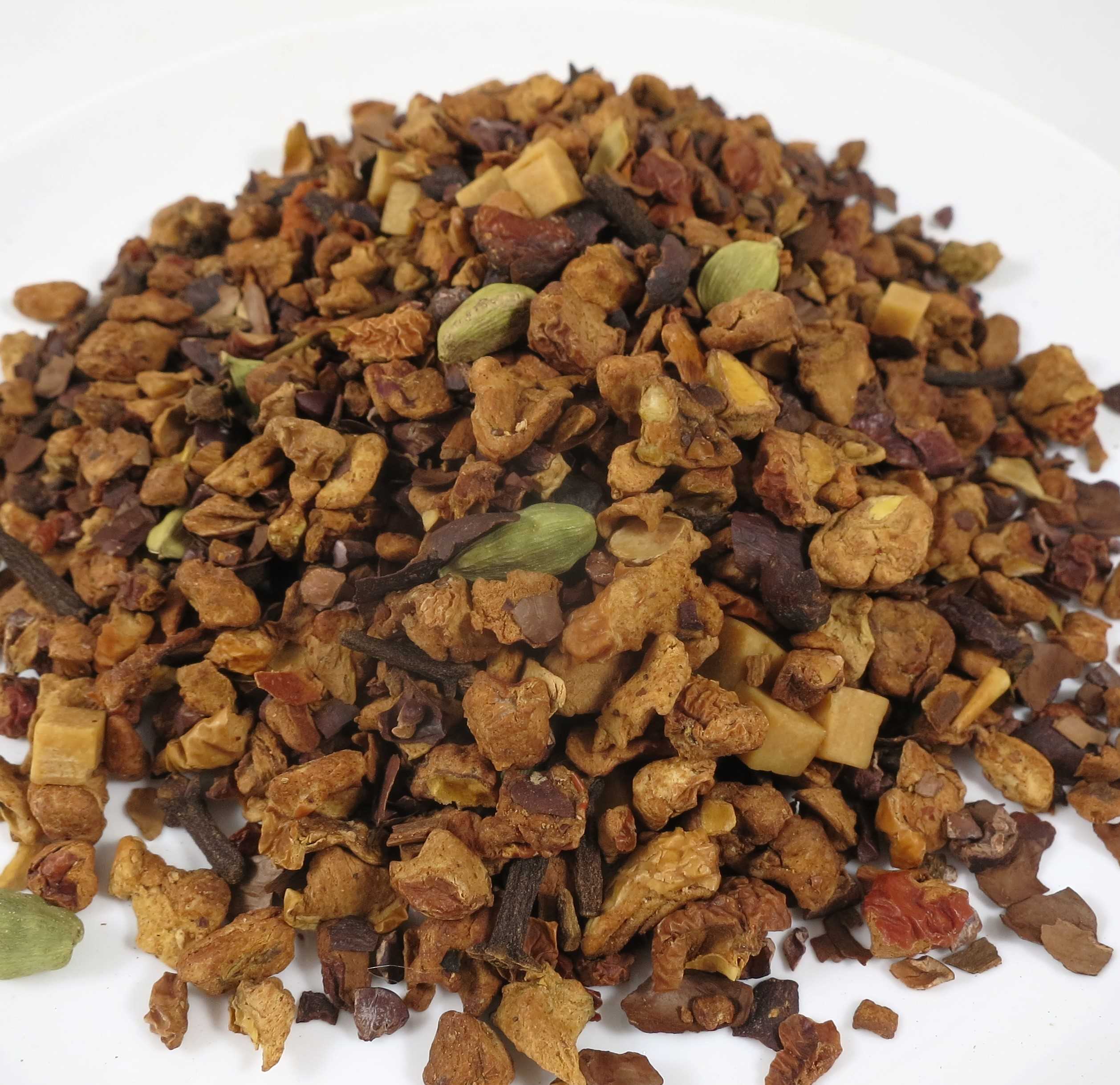 Apfeltee mit Karamellstücken und Kardamom. Zutaten aus Bio-Anbau